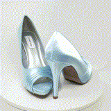 A pair of high heeled baby blue satin shoes with a peep toe and a hidden platform at the front of the shoes