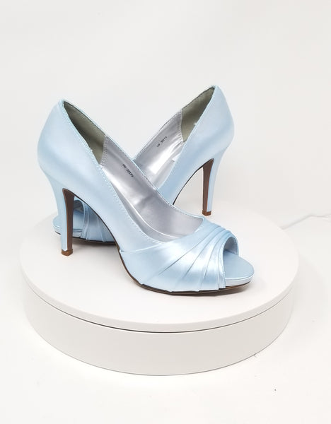 A pair of high heeled baby blue satin shoes with a peep toe and a hidden platform at the front of the shoes 