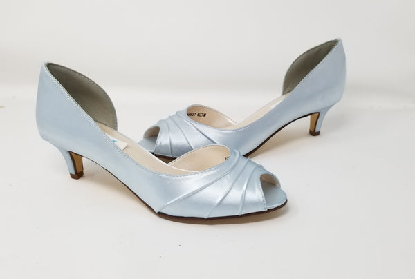 A pair of baby blue satin kitten heel shoes with a peep toe