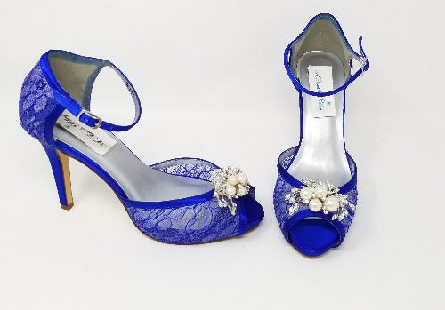 blue lace bridal shoes with pear and crystal design on the front of the shoes