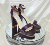a pair of high heel block shoes dyed eggplant purple with a front toe strap